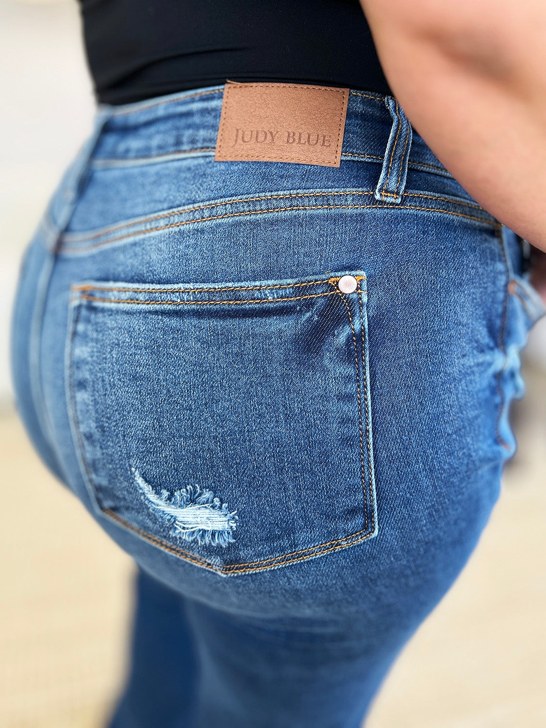 Raquel Mid Rise Distressed Raw Hem Jeans